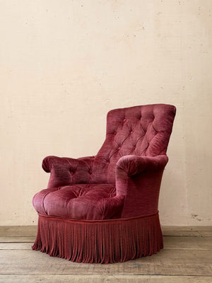 Pair of deep buttoned armchairs