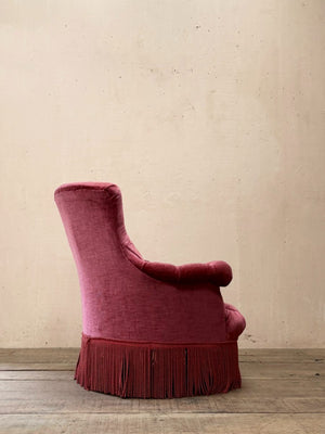Pair of deep buttoned armchairs