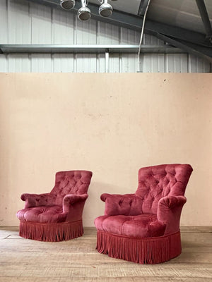 Pair of deep buttoned armchairs