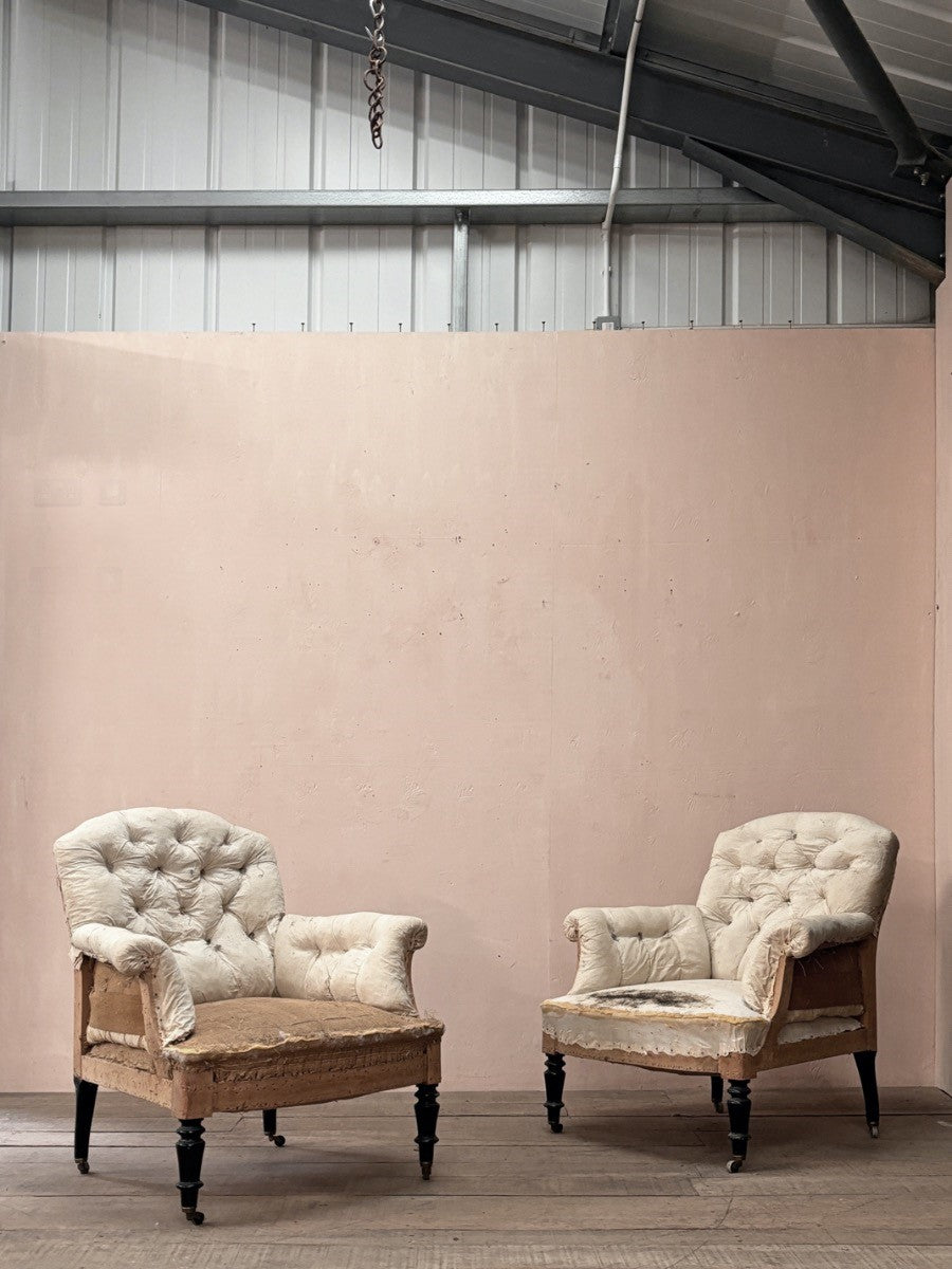 Pair of deep buttoned armchairs 'as is' (or + £1,200 for the re-upholstery option, ex. fabric)