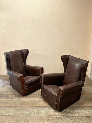 Pair of leather wing chairs 'as is'