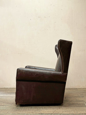 Pair of leather wing chairs 'as is'