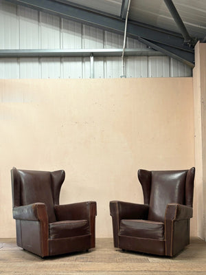 Pair of leather wing chairs 'as is'