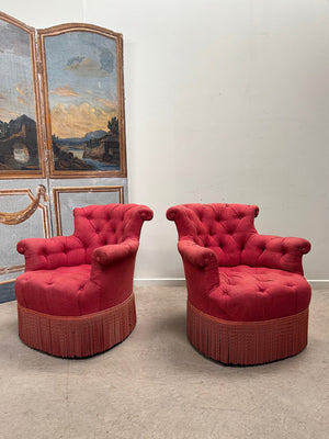 Pair of deep buttoned chapeau de gendarme armchairs