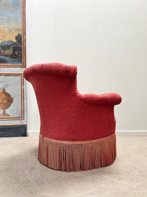 Pair of deep buttoned chapeau de gendarme armchairs