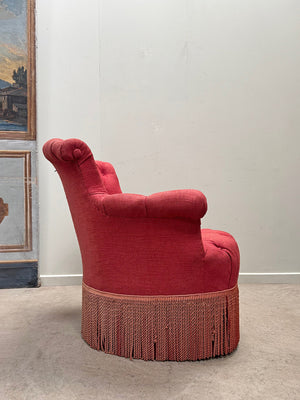 Pair of deep buttoned chapeau de gendarme armchairs