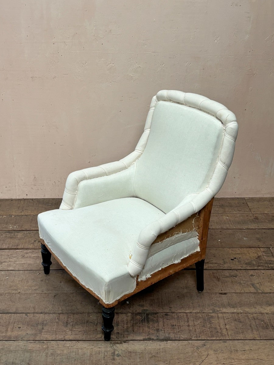 Rolled edge armchair