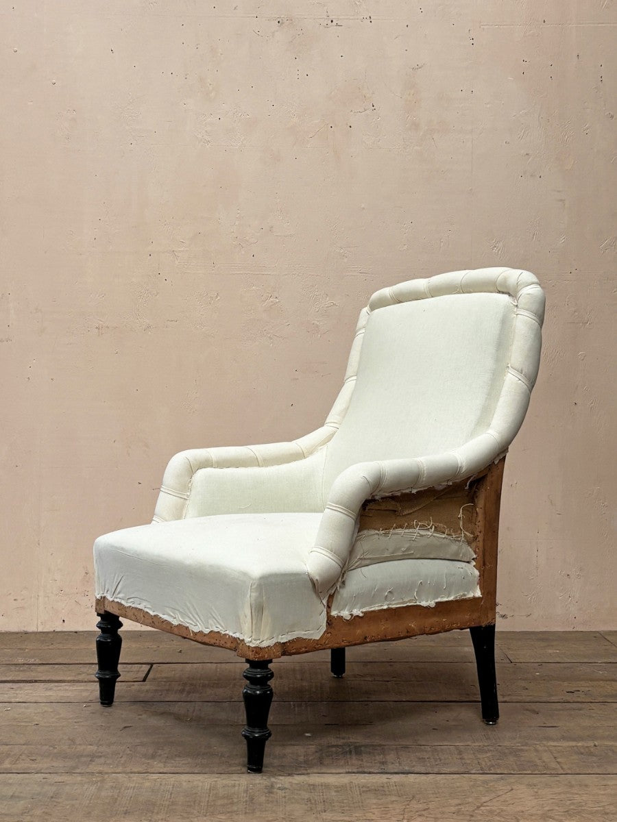 Rolled edge armchair