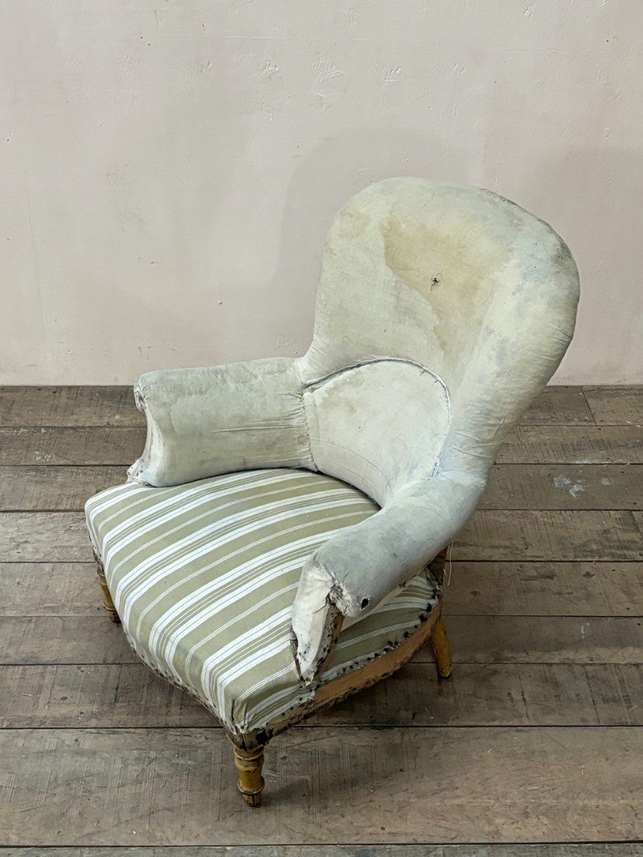 High rounded back armchair 'as is' (or £1,280 re-upholstered, ex. fabric)