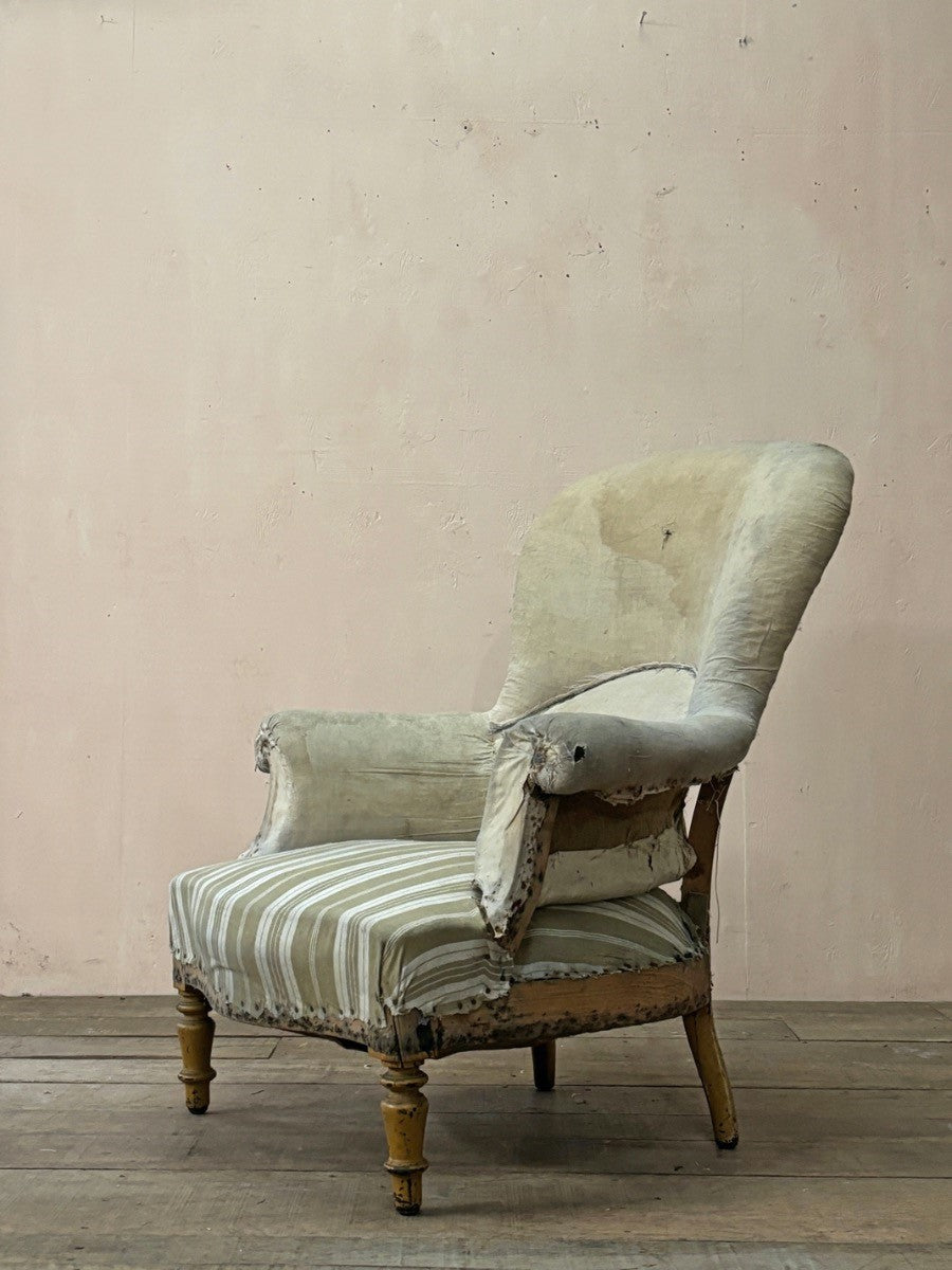 High rounded back armchair 'as is' (or £1,280 re-upholstered, ex. fabric)