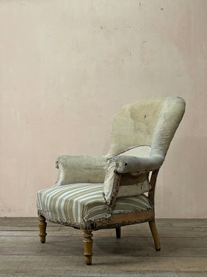 High rounded back armchair 'as is' (or £1,280 re-upholstered, ex. fabric)