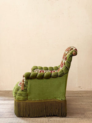 Scroll back armchair with rope edge