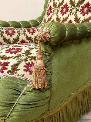 Scroll back armchair with rope edge