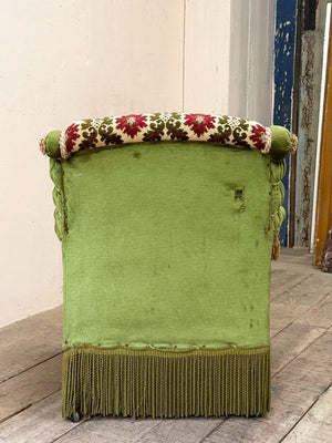 Scroll back armchair with rope edge