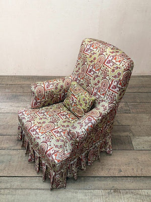 Armchair with skirt