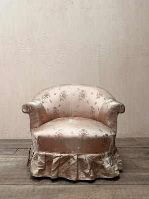 Satin skirted armchair