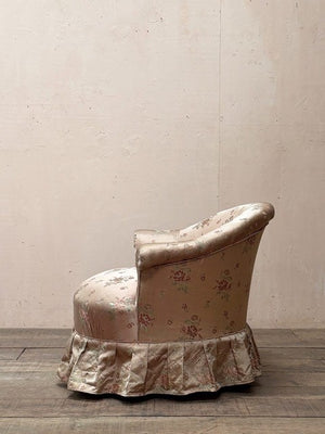 Satin skirted armchair