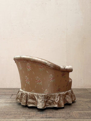 Satin skirted armchair