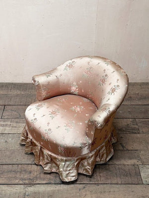 Satin skirted armchair