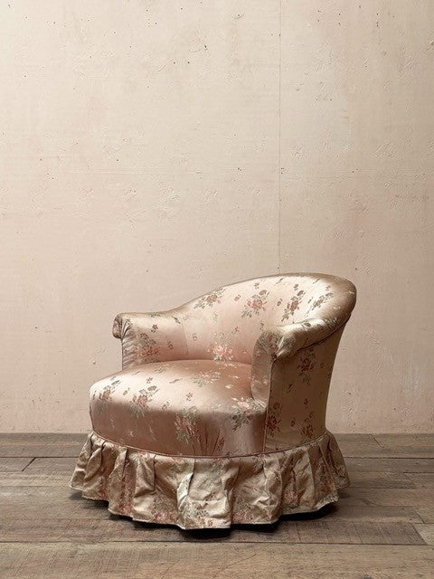 Satin skirted armchair