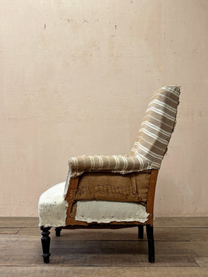 Ticking back armchair