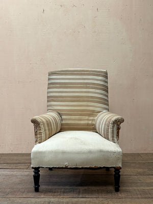 Ticking back armchair