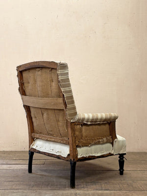 Ticking back armchair