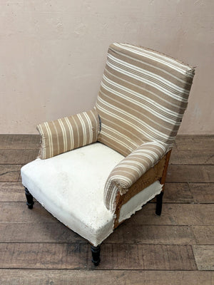 Ticking back armchair