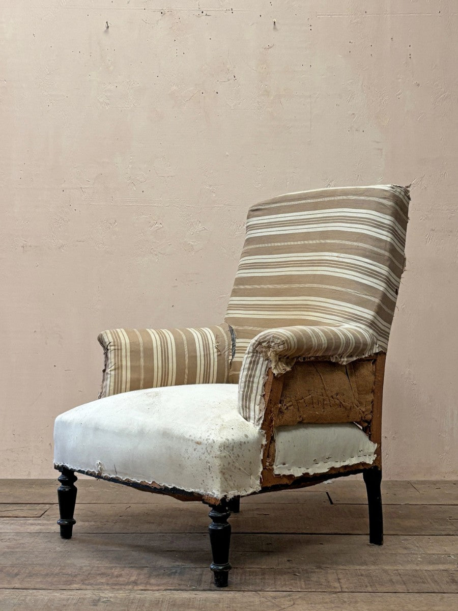 Ticking back armchair