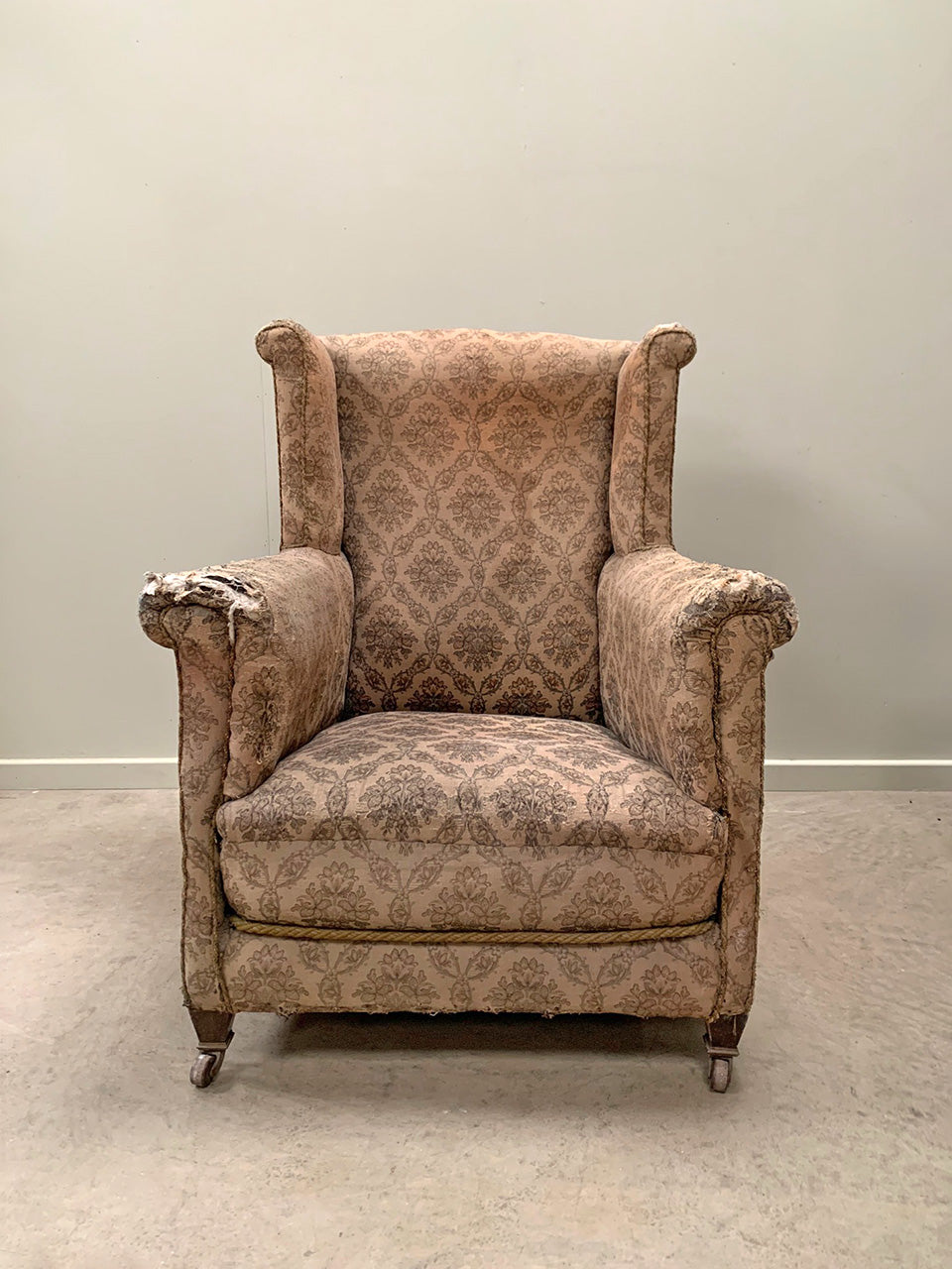 Early 20th century wing back armchair 'as is'