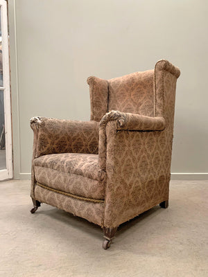 Early 20th century wing back armchair 'as is'