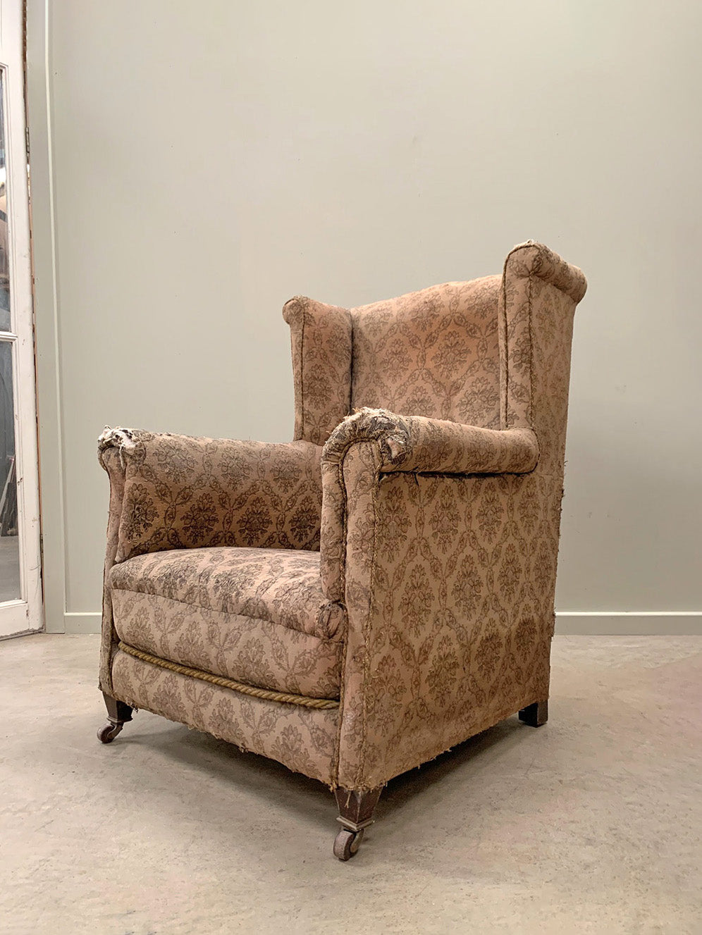 Early 20th century wing back armchair 'as is'