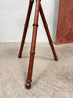 Faux bamboo tripod stand