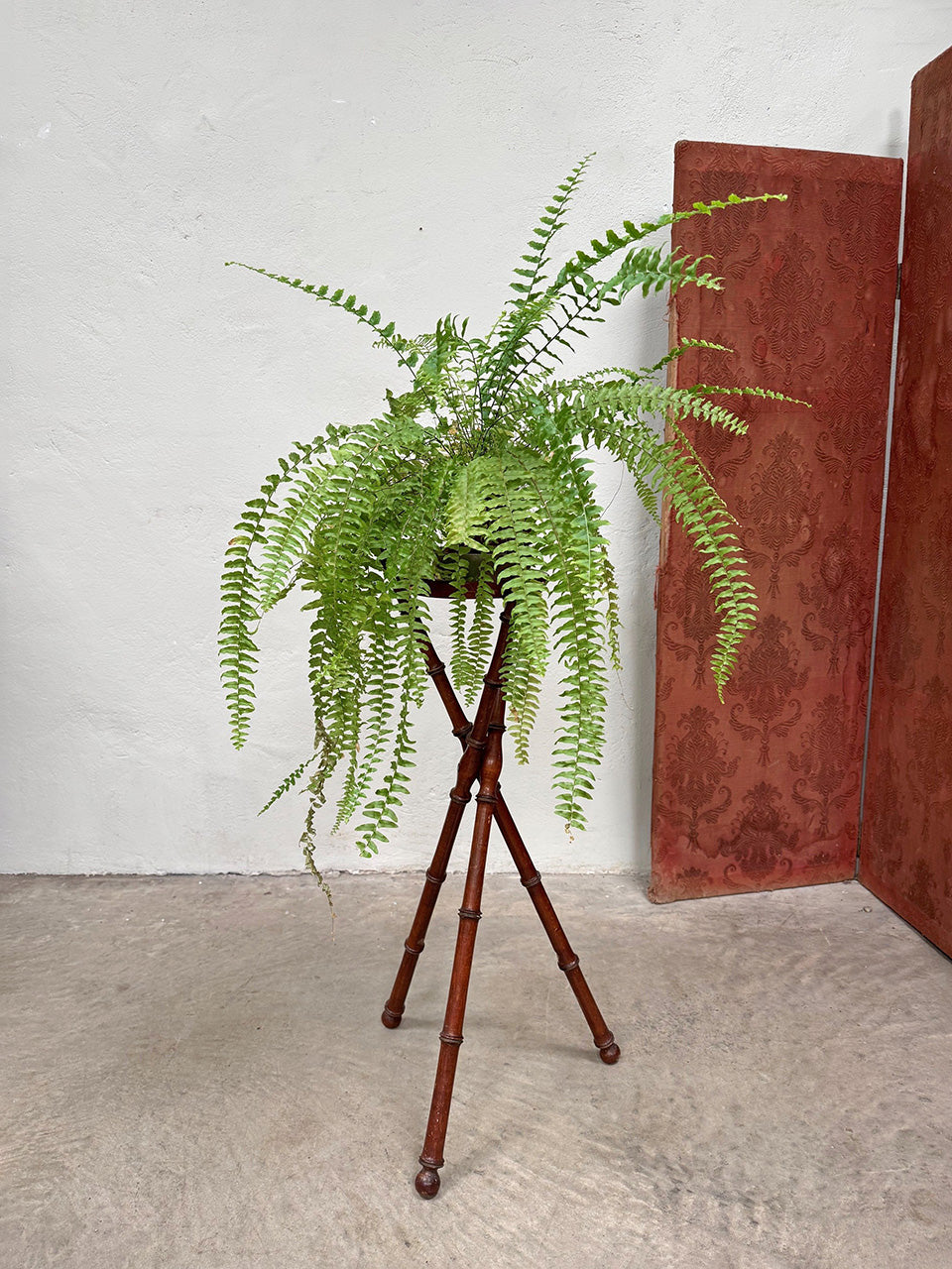 Faux bamboo tripod stand