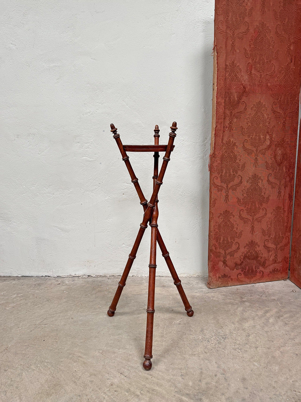 Faux bamboo tripod stand