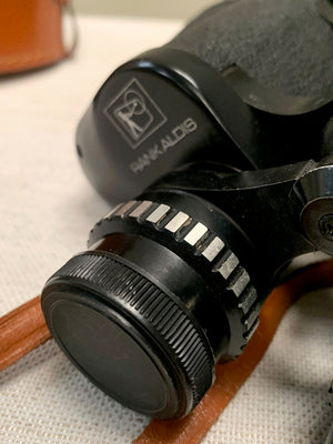 Binoculars with leather case