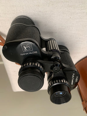 Binoculars with leather case