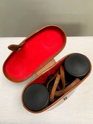 Binoculars with leather case
