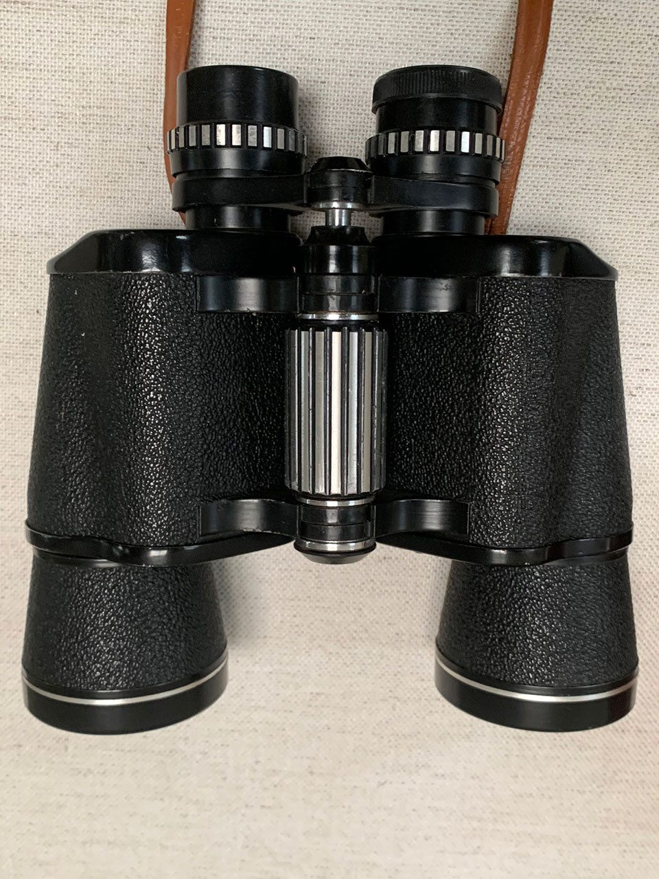 Binoculars with leather case