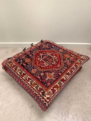 Two carpet floor cushions (each)