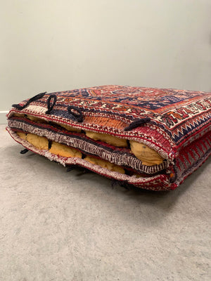 Two carpet floor cushions (each)