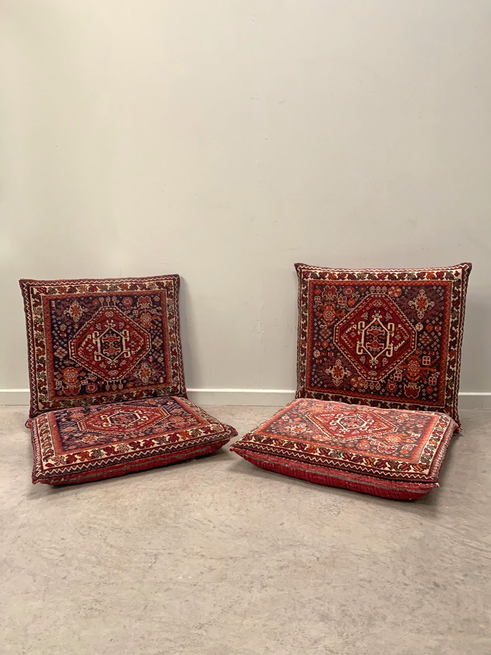 Two carpet floor cushions (each)