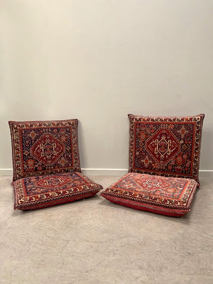 Two carpet floor cushions (each)