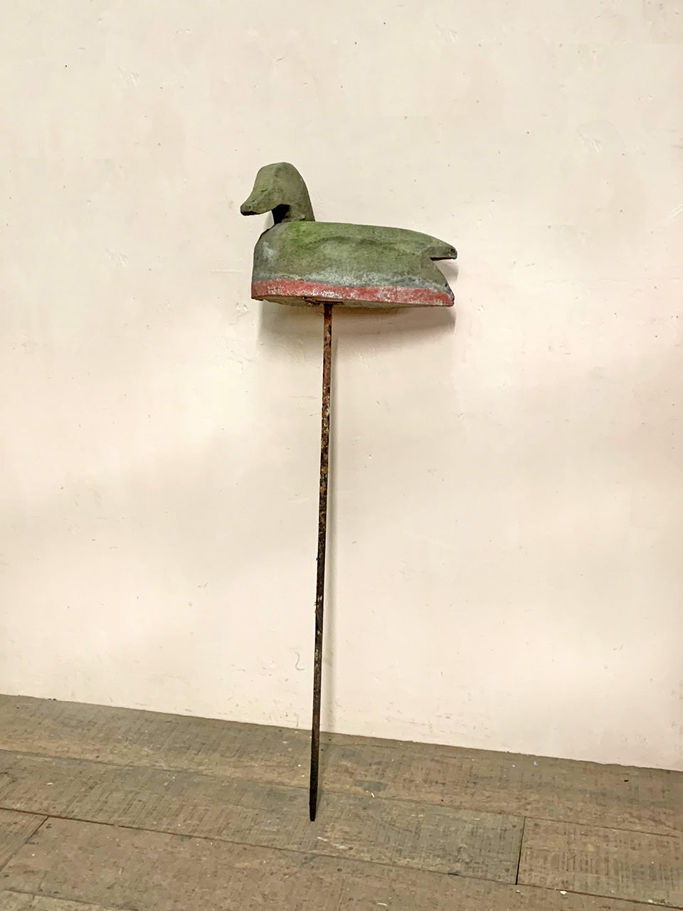Decoy duck mounted on a spike