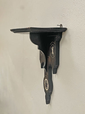 Ebonised wall shelf