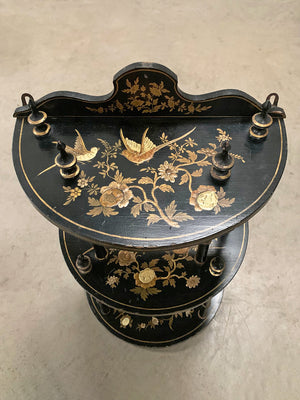 Ebonised and gilded wall shelf