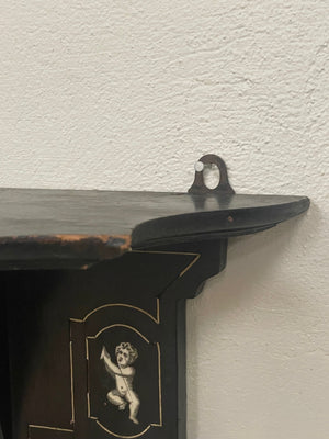 Ebonised wall shelf