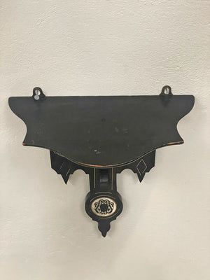 Ebonised wall shelf