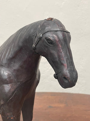 Leather bound horse