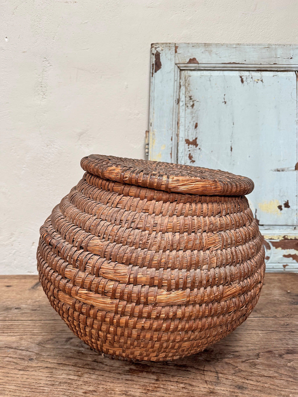 Lidded rattan storage container